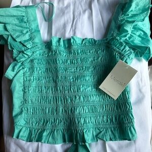Turquoise ruffled top